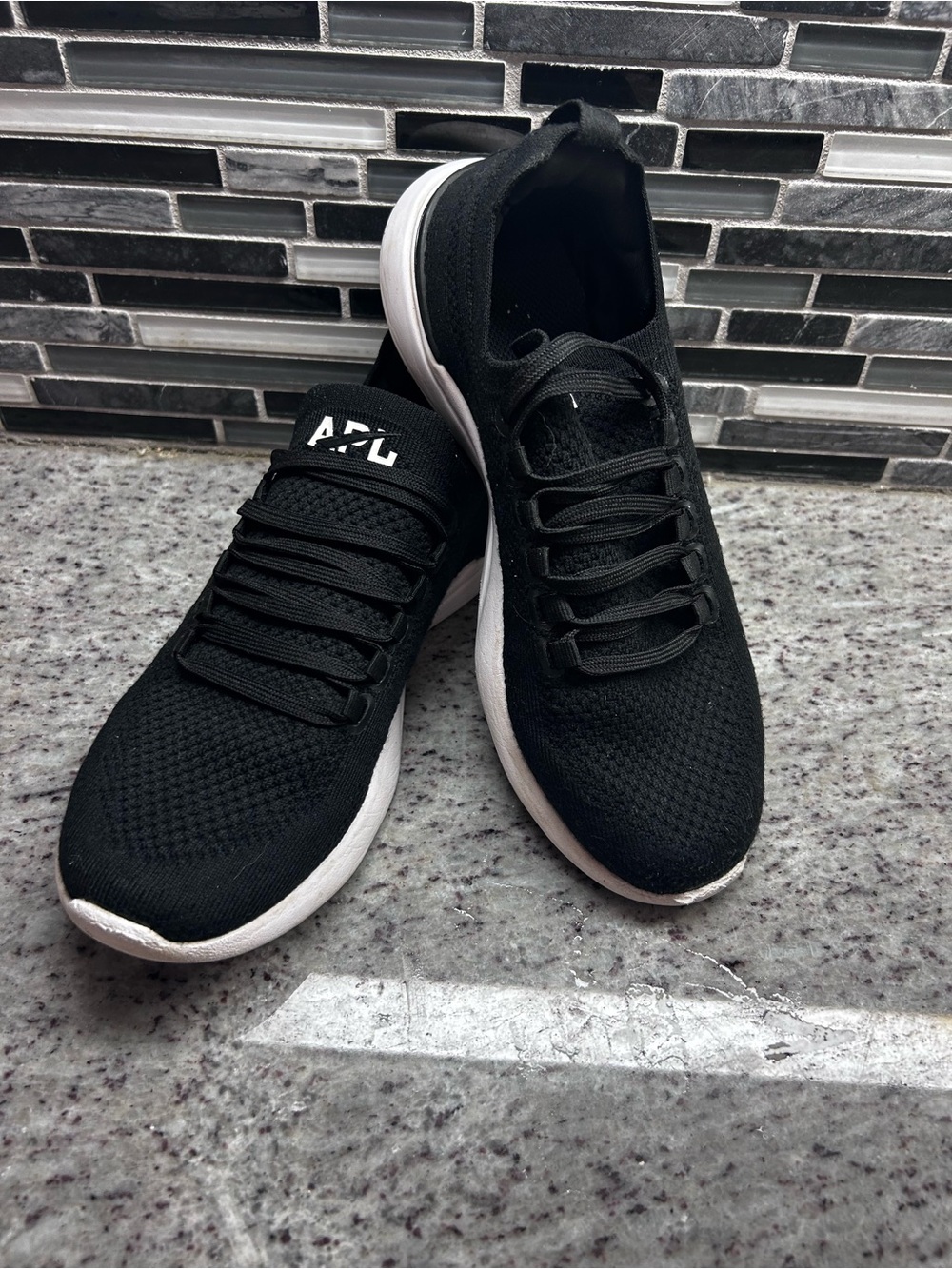 Womens APL Techloom Breeze Black Knit Slip-On Sneakers with White Sole size 7